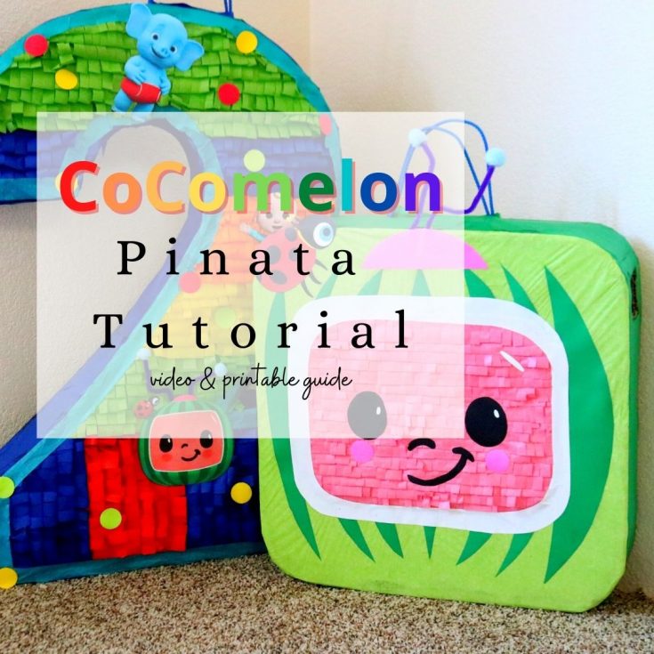 number 2 cocomelon themed pinata standing next to a cocomelon tv pinata