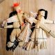 5 different native american corn husk dolls with either brown, orange, black, or white yarn hair