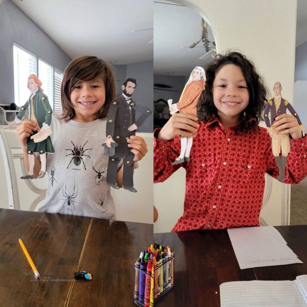 thomas jefferson, abe lincoln, john adams, and george washington paper dolls being held up by 2 choctaw boys for President's Day